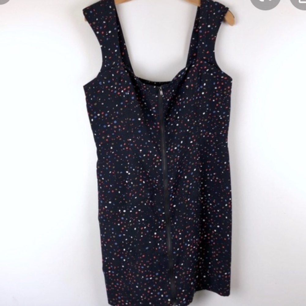 Cute BCBG mini dress featuring zipper on the front